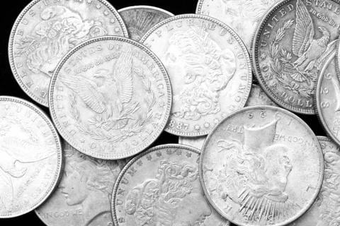 A group of Morgan silver dollars